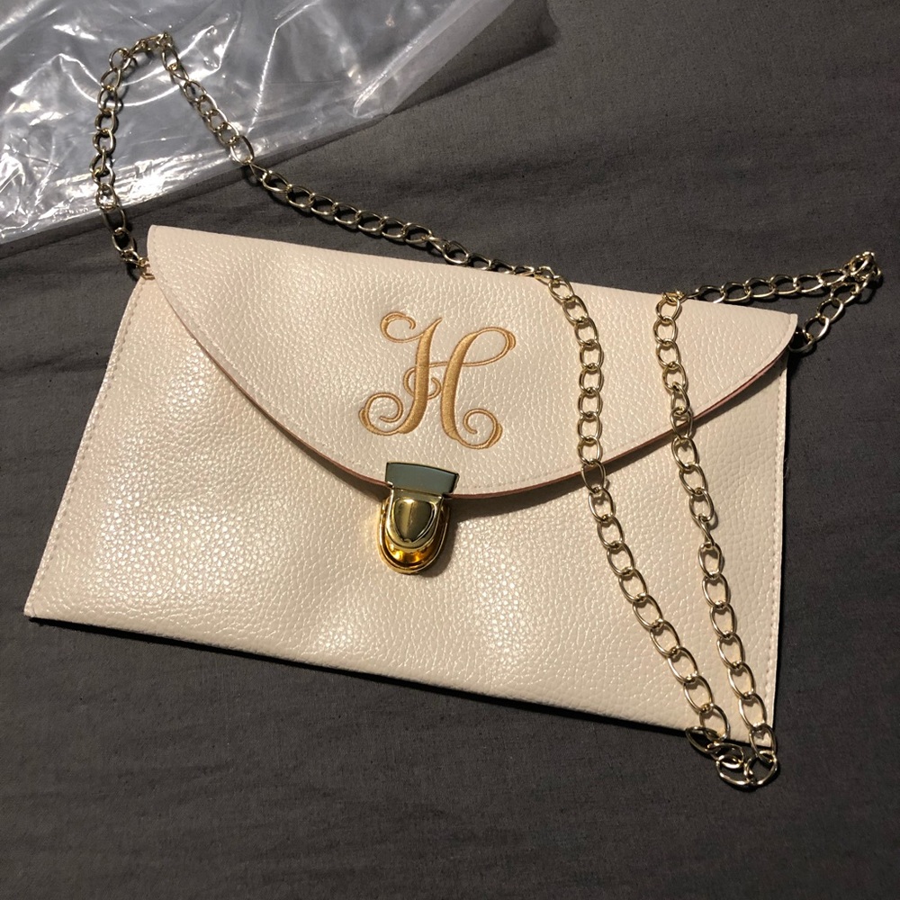 Ivory clutch H monogram